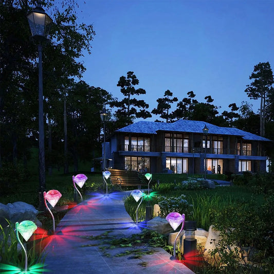 Brighten Your Outdoors with 7-Color Changing Solar Garden Lights - 4 Pack Waterproof LED Decorative Stakes for Pathway, Patio & Yard