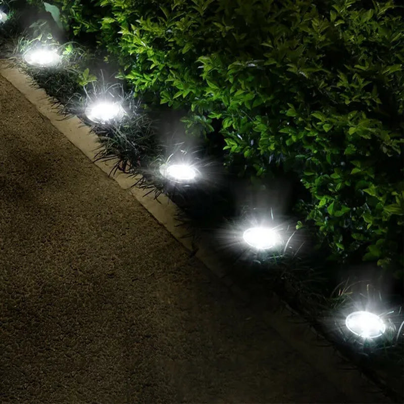 Illuminate Your Outdoors with 4-Pack Waterproof Solar Ground Lights - IP65 Rated Landscape Lighting