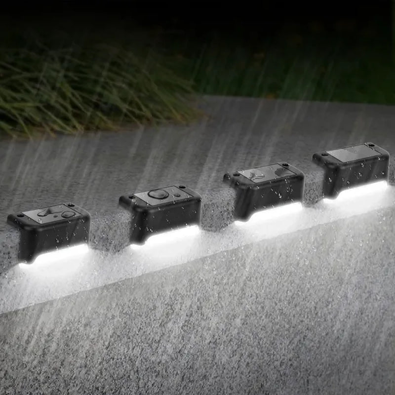Illuminate Your Outdoors: 4-Pack Solar Powered LED Step Lights - Water-Resistant & Dusk-Activated